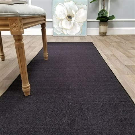  2299. . 12 ft runner rug with rubber backing